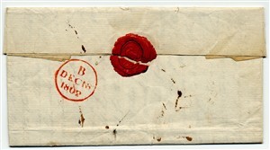 Colour photograph of a paper with a wax seal